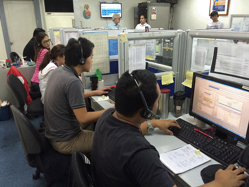 Forex World customer service staff at their desks in Ortigas, Metro Manila